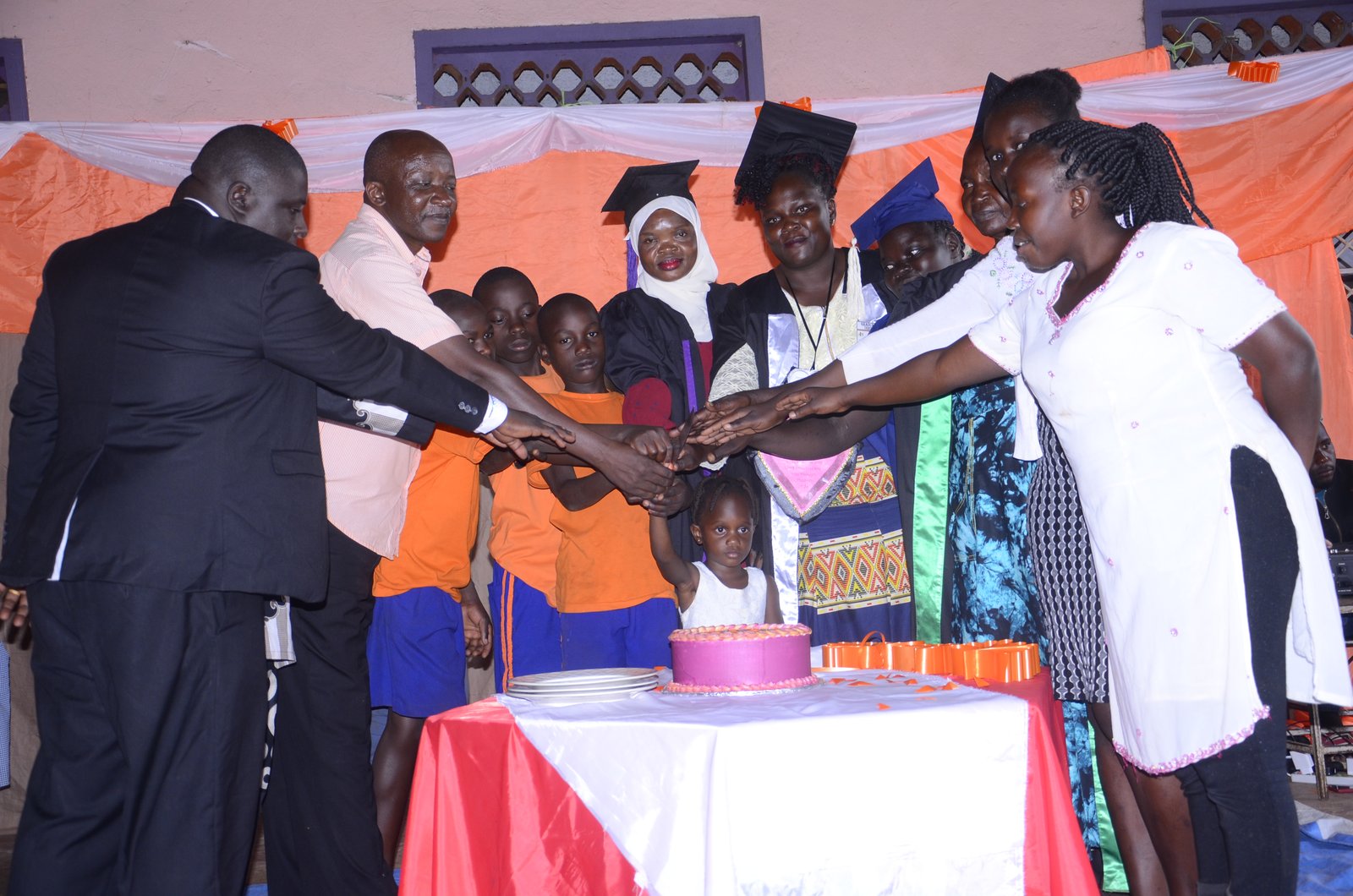 Staff and volunteers working with Child Restoration Outreach Uganda