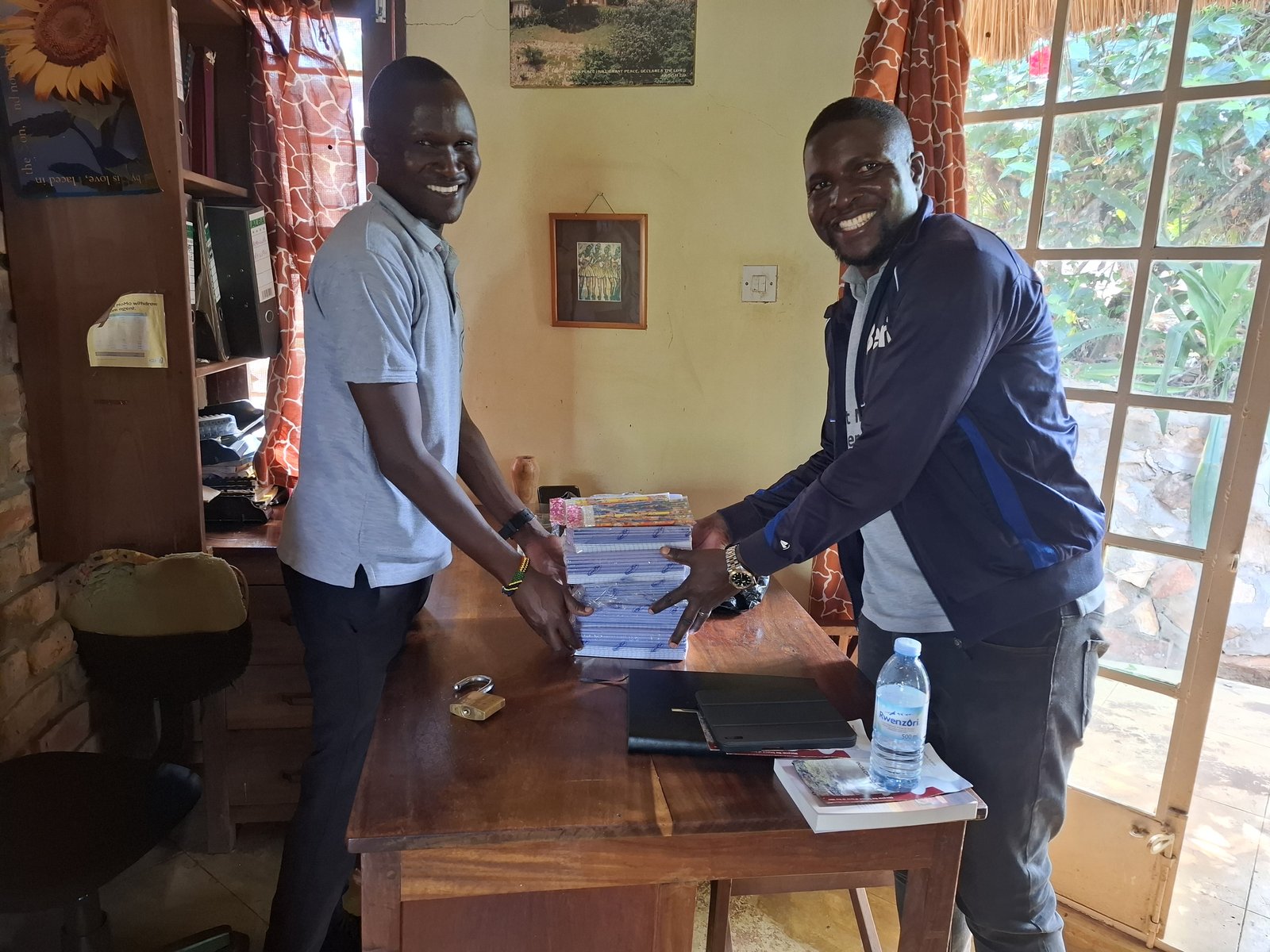 In-kind donations such as clothing for children supported by Child Restoration Outreach Uganda